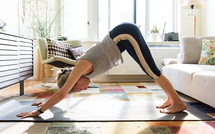 Woman in a downward dog asana